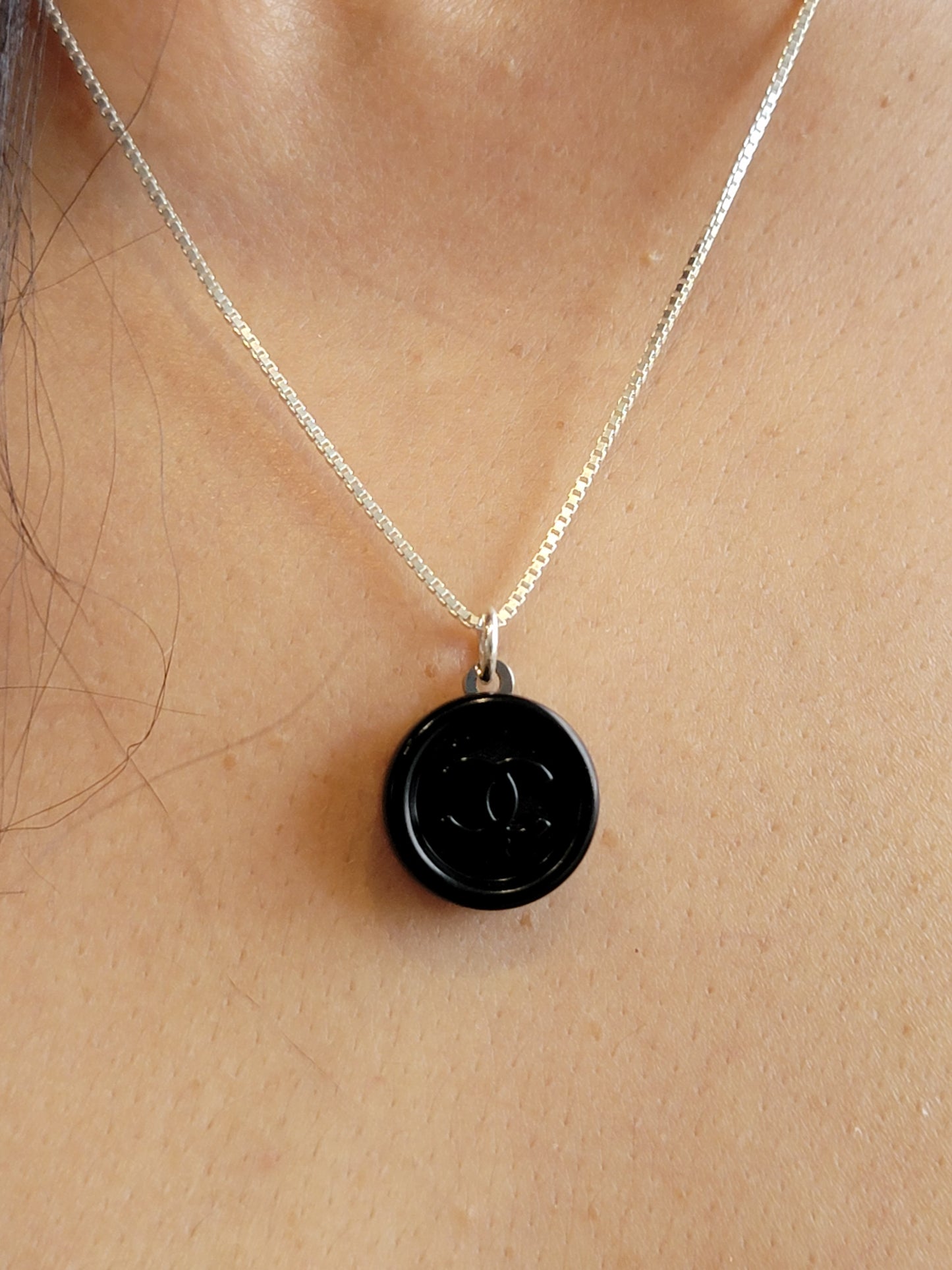BLACK ON BLACK WITH SILVER CHANEL VINTAGE BUTTON NECKLACE